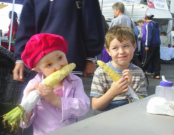 kids eating corn